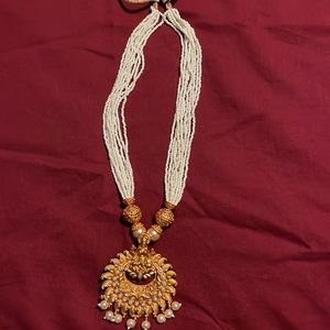 Imitation pearl necklace and earrings